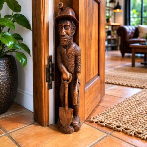 Hand-Carved Wooden Miner Figure with Pick and Spade